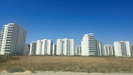 feature-tom-main-The-plains-of-Trikimo-are-coated-with-high-rises-but-the-infrastructure-is-not-in-place-to-support-them